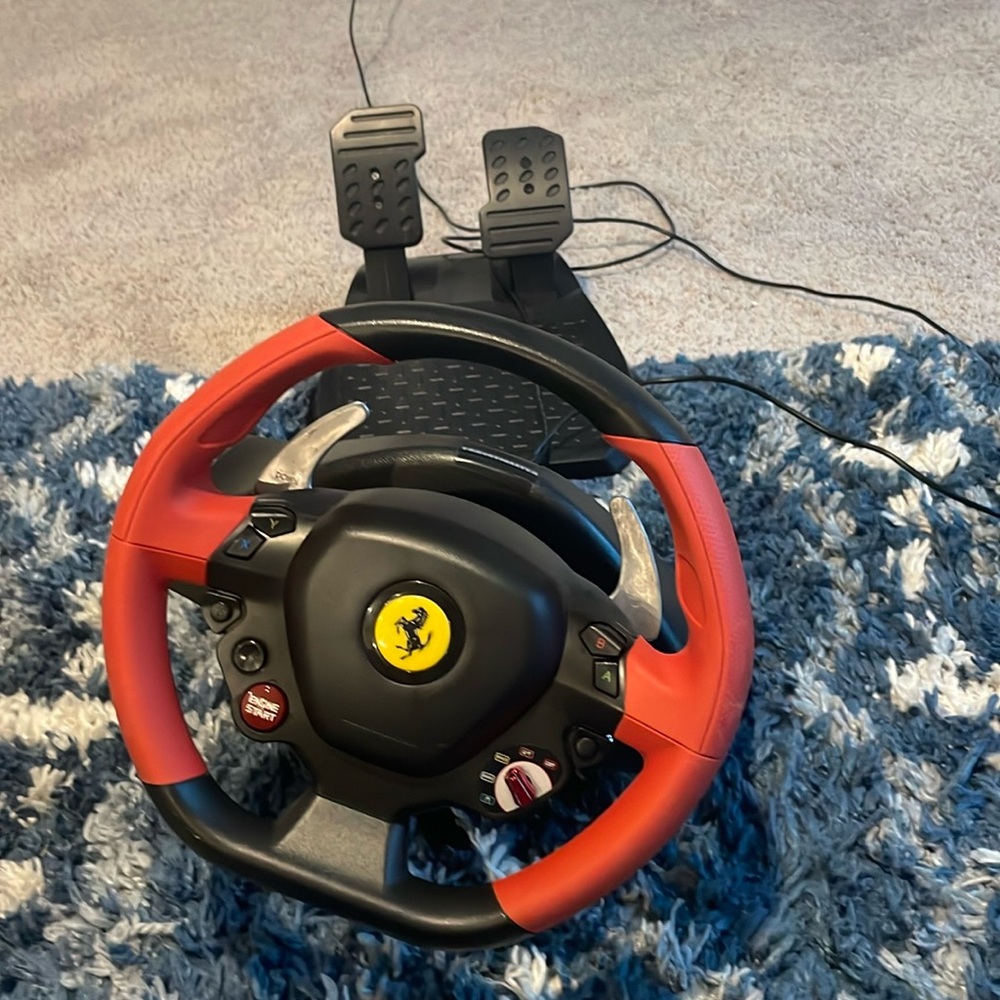 Thrustmaster pc or xbox stering wheel Ferrari all things work great condition.